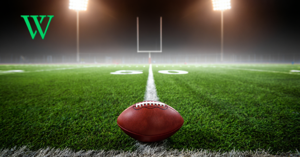 Football Sitting on a Football Field
