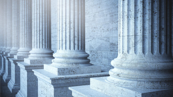 Cropped image of three grecian marble columns